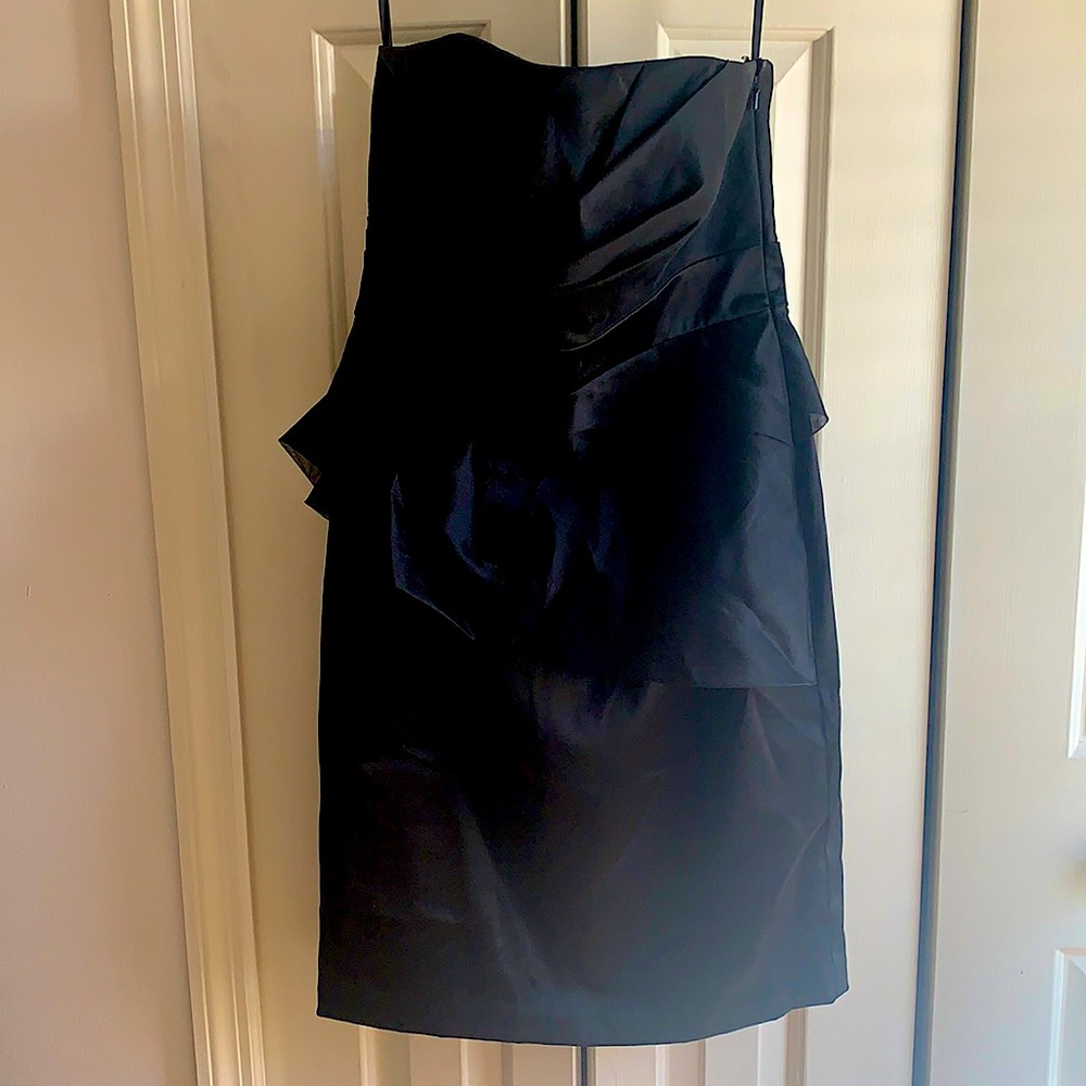 Solid black dress worn for a cocktail party x1